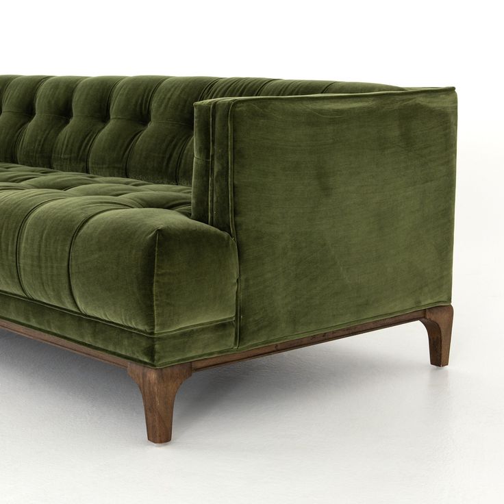 A low, tight mid-century silhouette in an intriguing sapphire olive features clean-lined arms and dramatic blind tufting. | Four Hands Dylan Sofa in Brown | Mathis Home Green Velvet Tufted Sofa, Green Velvet Couch, Olive Sofa, King Room, Tufted Sectional, Basement Fireplace, Velvet Tufted Sofa, Cozy Furniture, Green Book