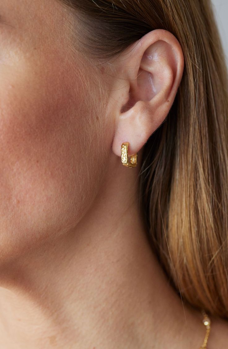 Show off elegant shine in hammered square hoop earrings crafted from 18-karat gold-plated sterling silver. Hinge with snap-post closure Sterling silver/18k-gold plate Imported Earrings Single Piercing, Cartalige Earrings, Small Drop Earrings Gold, Gold Hammered Huggie Earrings, Hammered Huggie Earrings For Anniversary, Gold Rectangular Huggie Earrings, Everyday Earrings Simple Classy, Gold Hoop Earrings Designs, Casual Gold Earrings