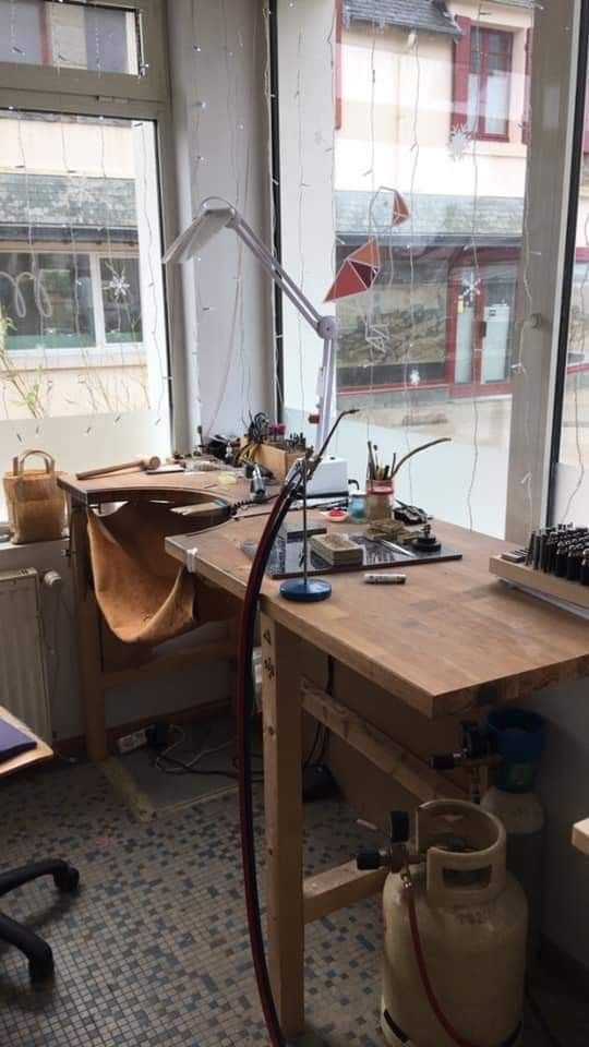 a workbench in front of a large window