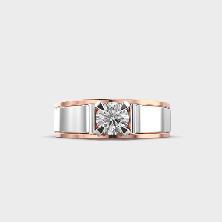 a white and rose gold ring with a diamond