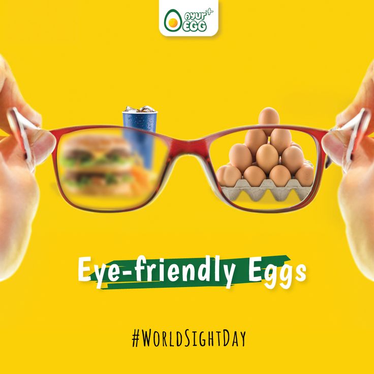 an advertisement for eye - friendly eggs with two hands holding glasses