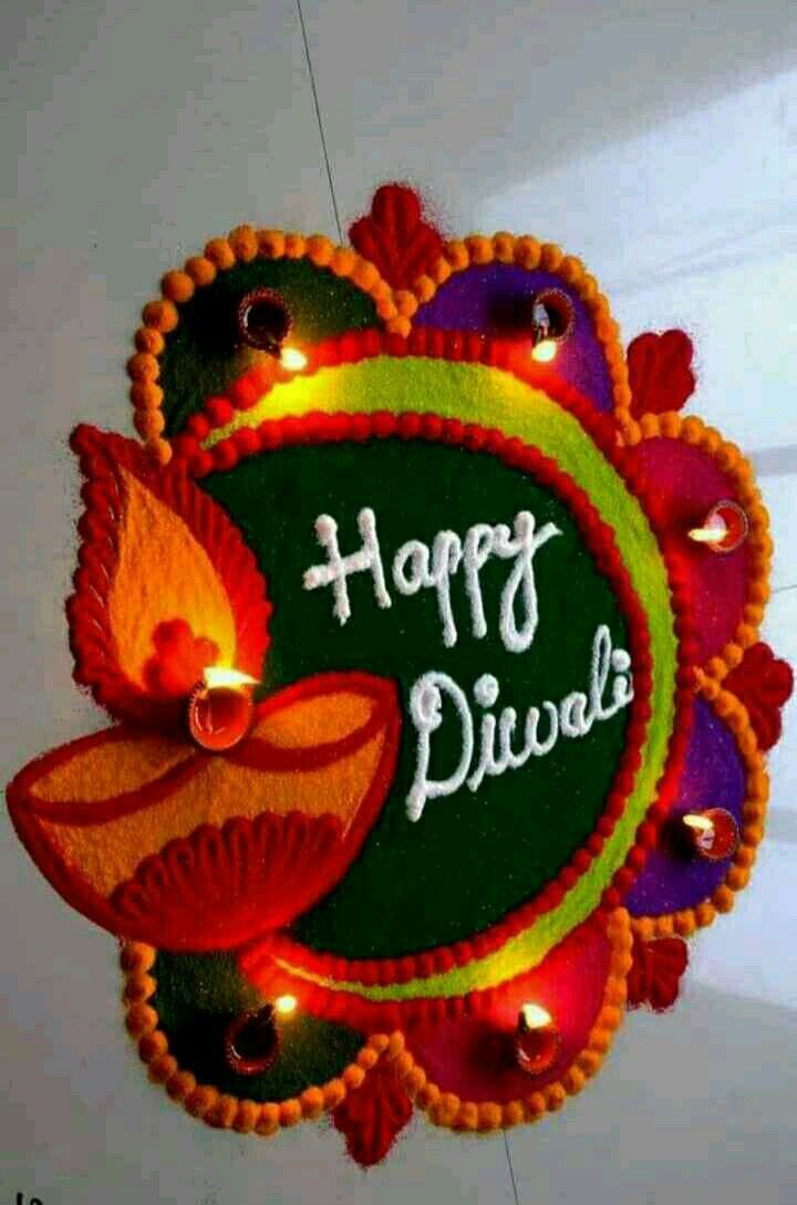 a happy diwali sign hanging from the ceiling with lights on it's side