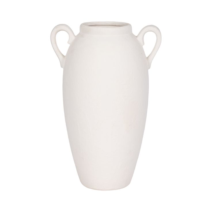 a white vase with two handles on the top and bottom, sitting against a white background