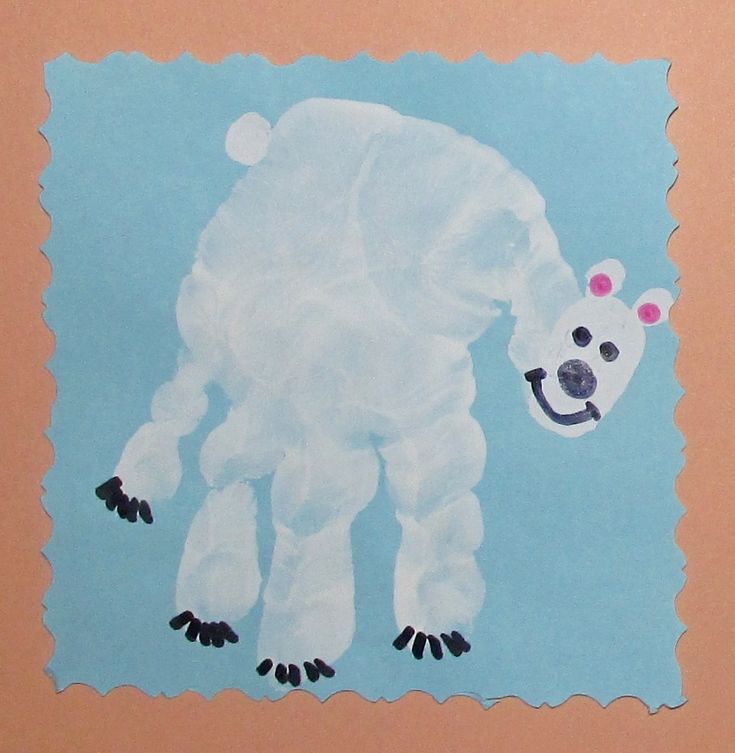 a paper cut out of a polar bear