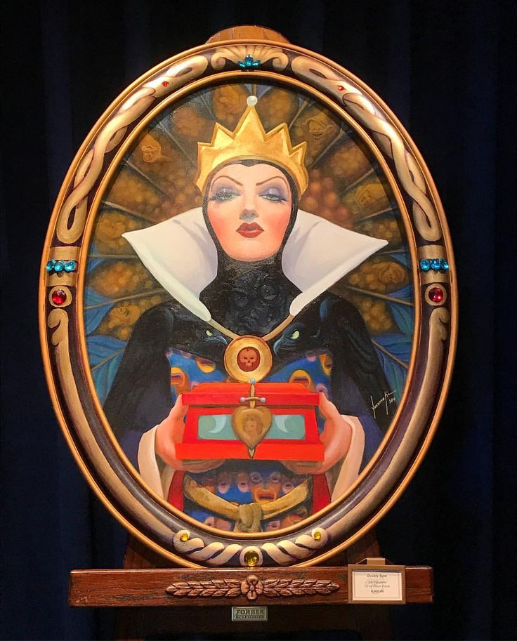 a painting on display in front of a blue curtain with gold trim and a woman holding a red box