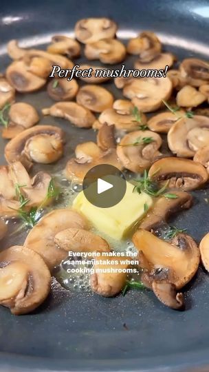 mushrooms being cooked in a pan with butter