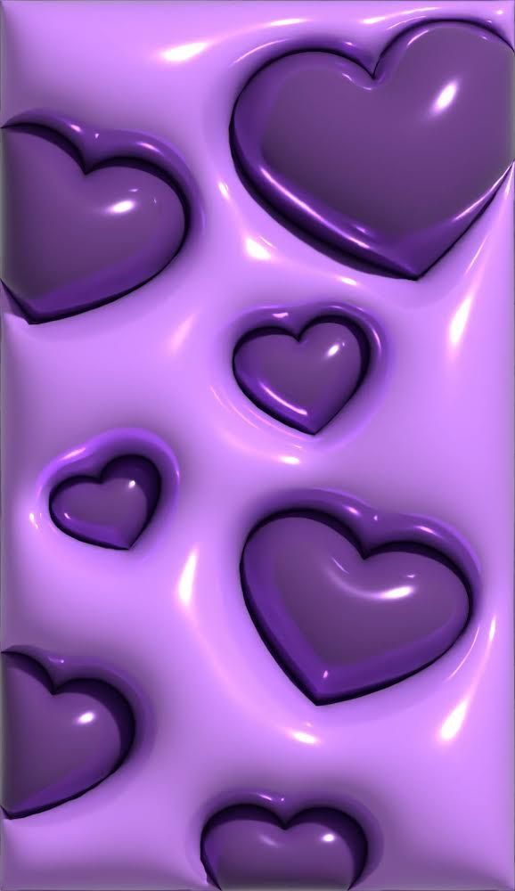 purple hearts are arranged in the shape of heart shapes