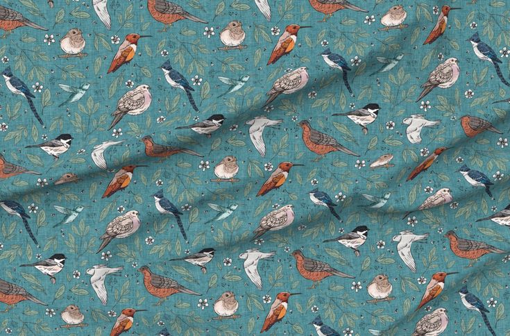 a blue fabric with birds on it