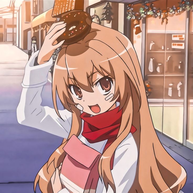 an anime character with long hair and a scarf on her head, holding a donut above her head