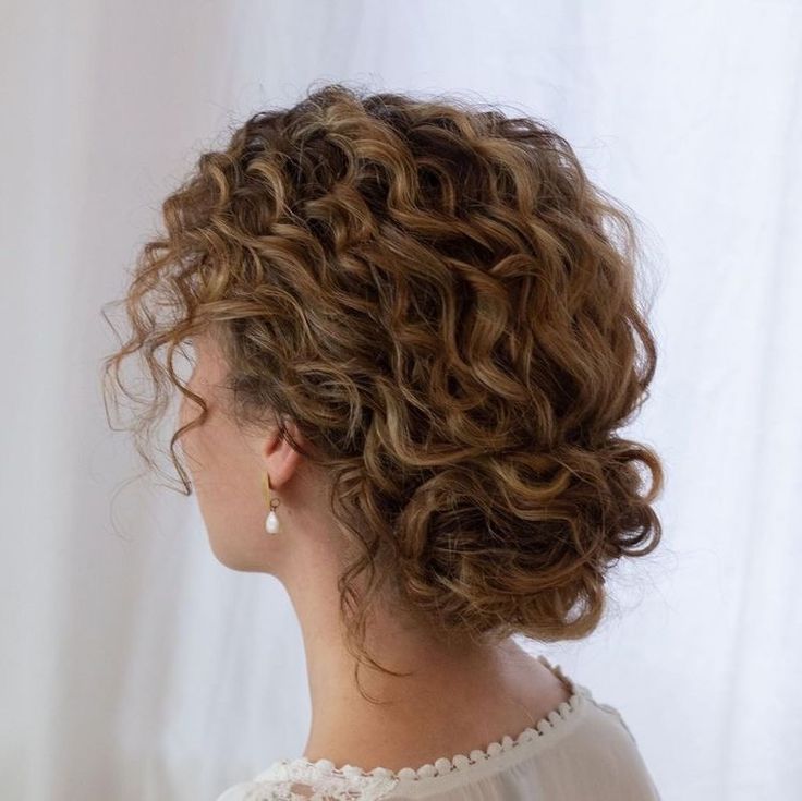 Curly Bun Bridesmaid, Curly Hair Bun Wedding Hairstyles, Wedding Hairstyles For Bridesmaids Curly Hair, Curly Hair Up Down Half Up Half Down, Wedding Updos For Medium Curly Hair, Curly Hair Bun Styles Wedding, Low Updo Curly Hair, Curly Low Bun Bridal Hair, Curly Short Prom Hair