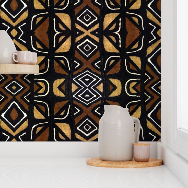 the wallpaper is designed with an abstract pattern and has two vases in front of it