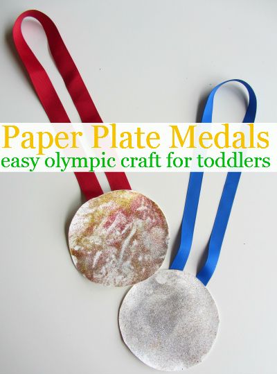 paper plate medals are displayed with red, white and blue ribbons on the bottom one