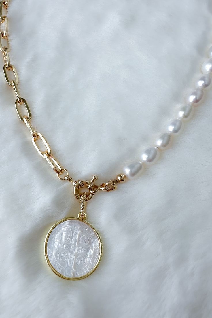 Beaded St. Benedict Necklace ..................................... MATERIAL AND SIZE Mother of pearl pendant 18k gold filled chain Pendant size: 2.1cm Length 18 inches …………………………………. Rosary Ideas, Saint Benedict Medal, Benedict Medal, Mother Of Pearl Pendant, Beautiful Accessories, Saint Benedict, St Benedict, Protection Necklace, Catholic Gifts