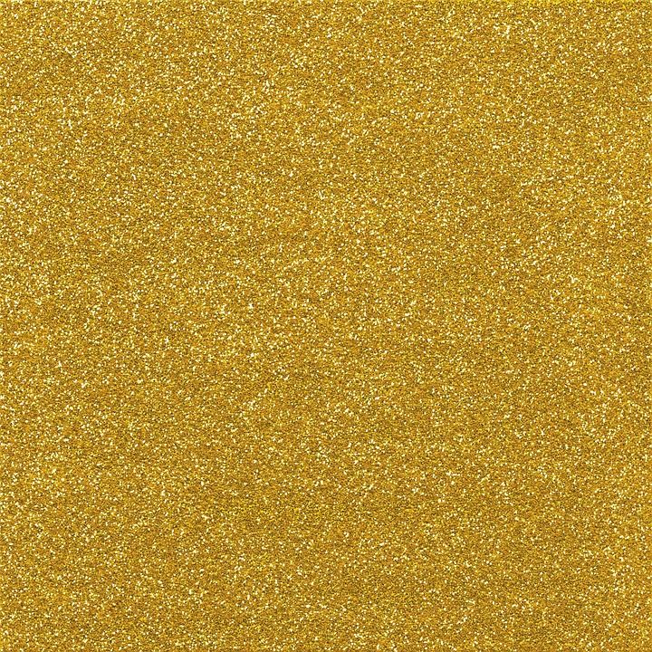 a yellow glitter background with some white dots