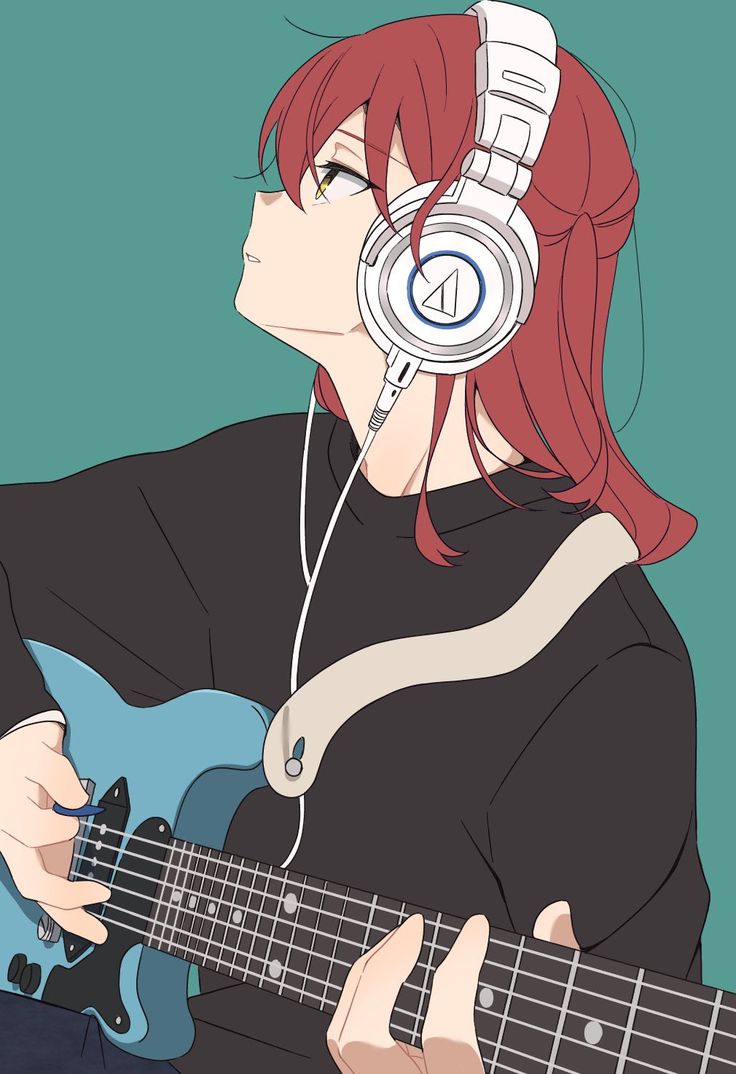 a girl with headphones on playing an electric guitar