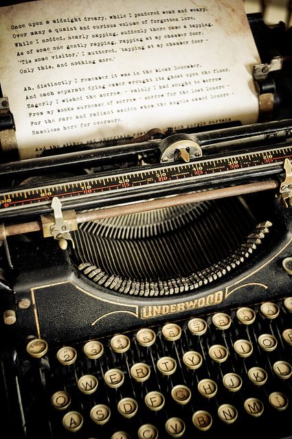 an old fashioned typewriter with a poem written on it