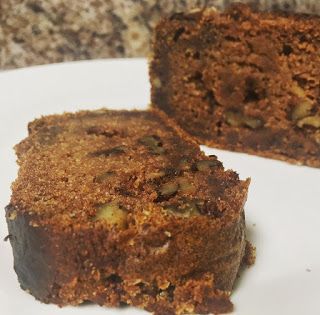 two pieces of cake sitting on top of a white plate