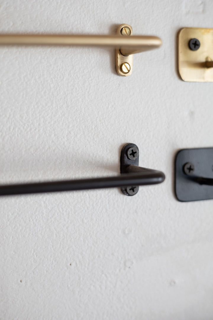 the door handles are black and brass, but not white or gray in this photo