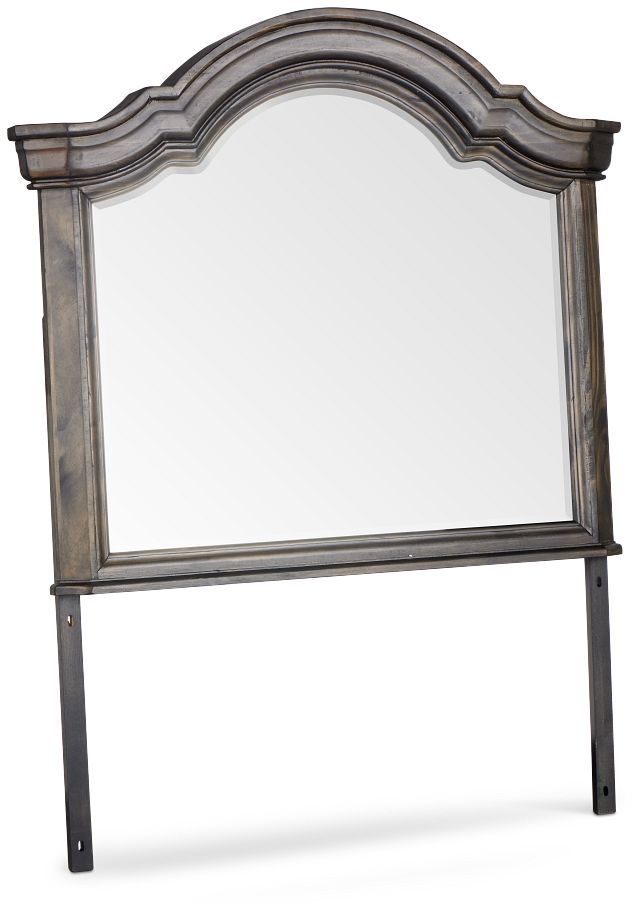 a large mirror sitting on top of a wooden frame