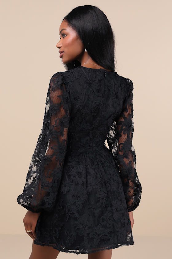 Endless compliments will always be the result of strutting out in the Lulus Gorgeous Outcome Black Mesh 3D Applique Long Sleeve Mini Dress! Three-dimensional floral-like appliques adorn a sheer mesh overlay (with dainty polka dot details throughout) as it shapes a lightly gathered bodice, a V-neckline, and sheer balloon sleeves with elastic at the cuffs. A banded, empire-style waist boasts two, tying velvet ribbon bows at the center, all atop a flirty skater skirt with a mini hem. Hidden back zipper/clasp. Fit: This garment fits true to size. Length: Mid-thigh. Size medium measures 33.25" from shoulder to hem. Bust: Great for any cup size. Waist: Fitted - very fitted at natural waist. Hip: Not Fitted - fuller skirt allows room for hips. Undergarments: May be worn with any standard bra. Fab 3d Applique, Vegas Dresses, Gathered Bodice, Rush Dresses, Latest Fashion Dresses, Women Best, Feather Dress, Empire Style, Gala Dresses