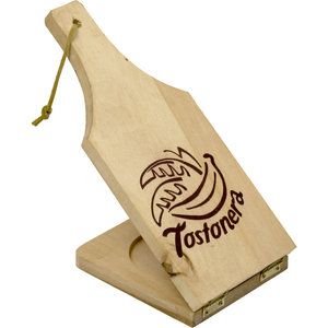 a wooden bottle opener with a banana on it