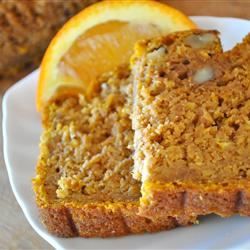 two slices of cake on a plate with an orange