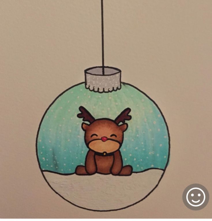 a christmas ornament hanging from a ceiling with a reindeer on it's head