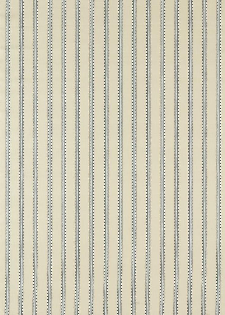 a white and blue striped wallpaper with vertical lines on the bottom half of it