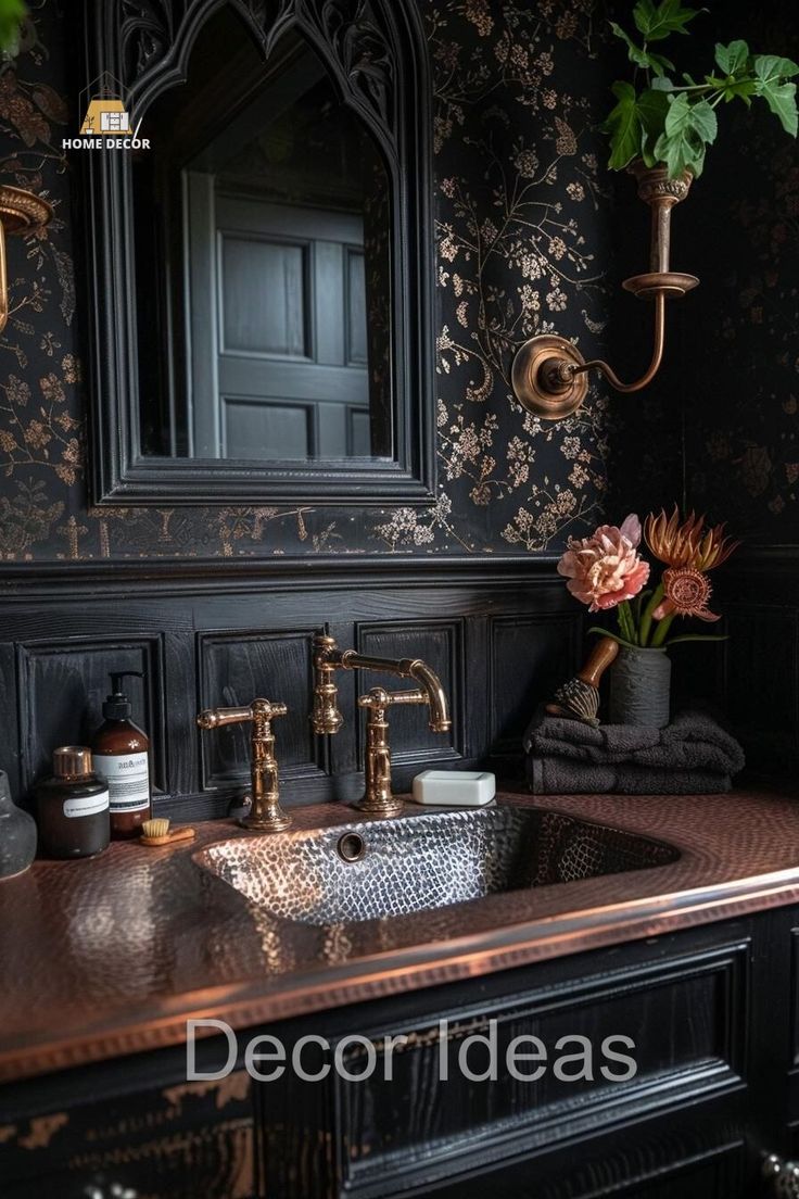 a bathroom sink sitting under a mirror next to a wall mounted faucet with flowers in it