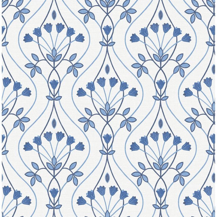 a blue and white wallpaper pattern with flowers on the side, as well as leaves