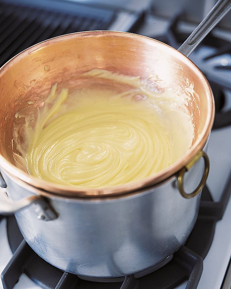 a saucepan is sitting on top of the stove