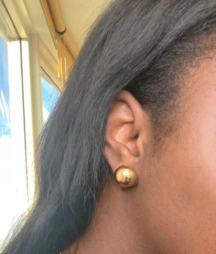 These classic gold ball studs are a must have. These balls are our newest size, 14 -16 mm. They are a bold statement piece. Our gold-ball studs are made with combination of brass and lower percentage of gold filled. They are fashion studs and can be made with 14k gold posts. Contact us for additional requests Classic Gold Sphere Earrings, Gold Ball Earrings, Judaica Jewelry, Ball Stud Earrings, Ball Drop, Ball Bracelet, Endless Love, Classic Gold, Jewellery Designs