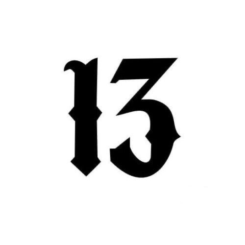 the number thirteen is shown in black and white