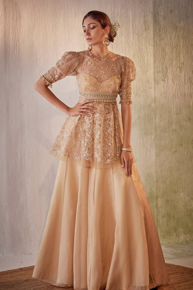 Beige tulle peplum top sharara set from designer sharara dress collection Top Sharara Set, Organza Sharara, Heena Kochhar, Sharara Designs, Pakistan Dress, Yellow Kurta, Kurta Sharara Set, Kaftan Tunic, Kurta Sharara