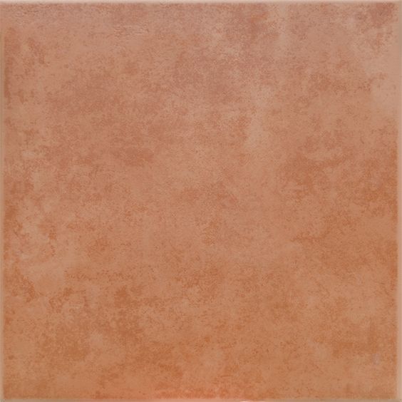 an orange square shaped tile with no edges