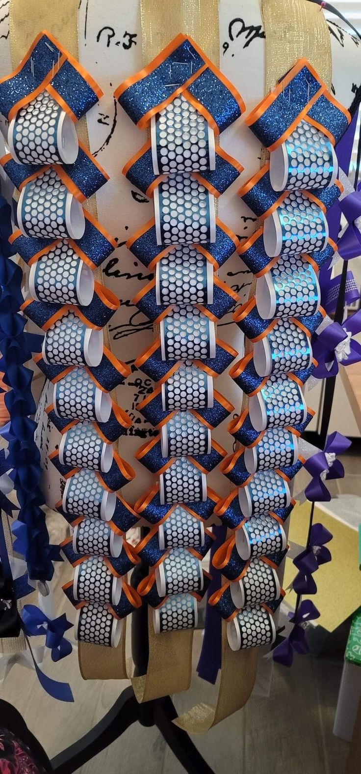 an assortment of blue and orange items on display