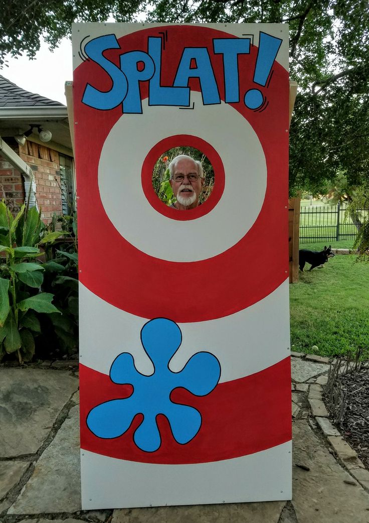 a sign that says, splat with an image of a man's face in the center