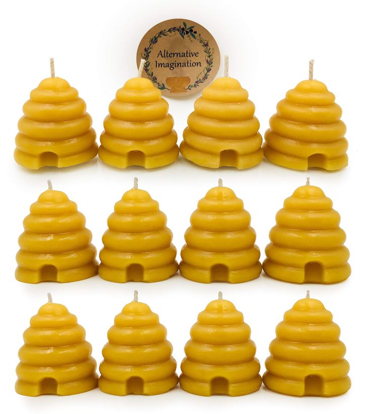 beeswax candles are lined up in rows and arranged to look like they have been made out of wax