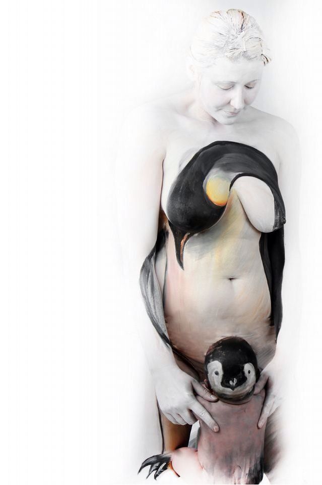 a painting of a woman holding a penguin