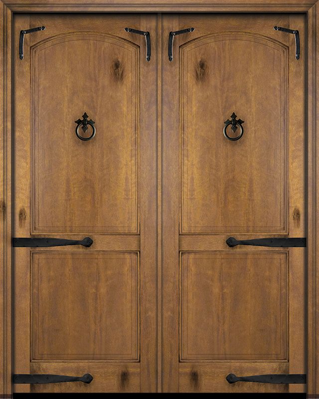 two wooden doors with metal handles on each side and an arched door at the top