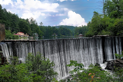 a large waterfall with water flowing over it