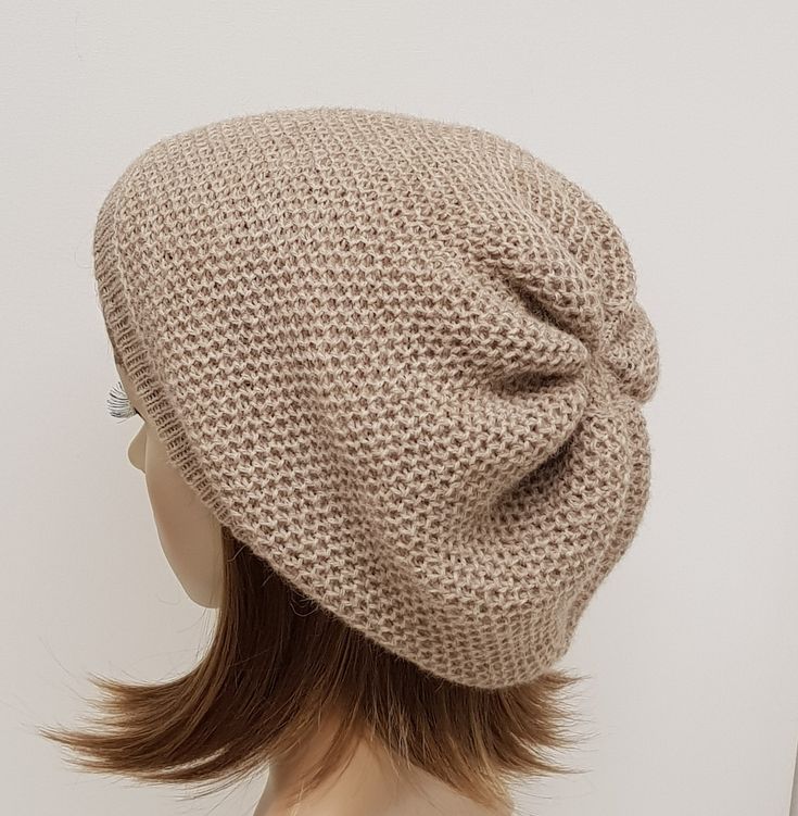 Handmade baggy beret for women, winter beanie, knit tam, slouchy beanie, knit baggy beanie, knitted from 100 % alpaca wool. PLEASE CONTACT ME FOR DIFFERENT COLOURS. The Hat is available in three different sizes : S- 51-54 cm (20-21 inches) in circumference M- 54-57 cm (21-22.5 inches) in circumference L- 57-60 cm (22.5-23.5 inches) in circumference If you would like the hat in special size ,please contact me I will make it for you. Also available to order the matching fingerless gloves. Just con Brown Knit Beanie, Knitted One-size Bonnet, Slouchy Beanie Bonnet, Beige Knit Crochet Beanie Hat, Soft Knit Crochet Hat, Soft Knit Yarn Crochet Hat, Slouchy Knitted Beanie Bonnet, Knitted Alpaca Hats, Knitted Yarn Beret One Size