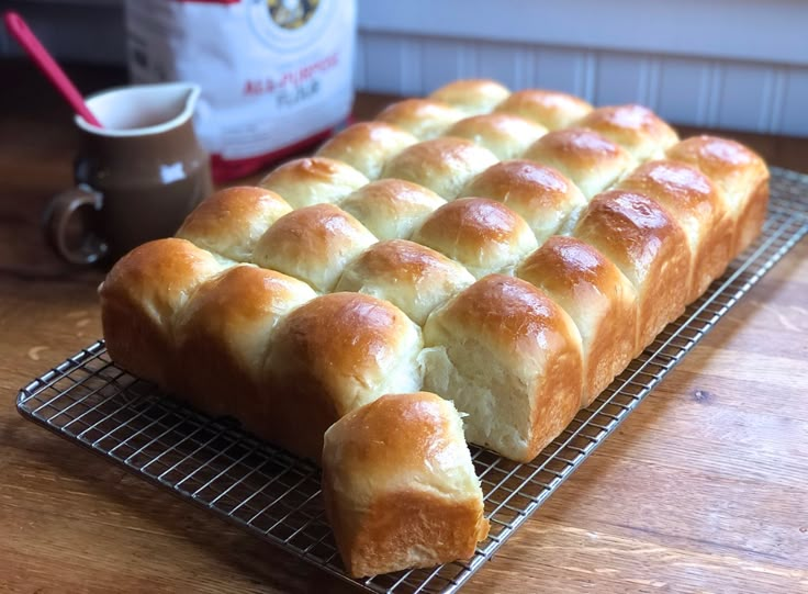 a loaf of bread sitting on top of a cooling rack