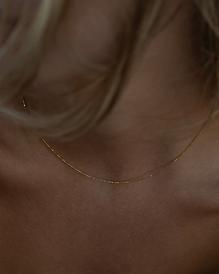 Dainty is the name, everyday wear is the game. Made in solid 14k gold, The Mini Bead Chain is the perfect for anyone that loves a minimal, clean look. Fine Gold Chain Necklace, Minimilastic Jewelry, Gold Chain Dainty, Simplistic Gold Jewelry, Gold Necklace Aesthetic Simple, Minimal Gold Jewelry Aesthetic, Dainty Gold Chain Necklace, Small Dainty Jewelry, Simplistic Jewelry Aesthetic