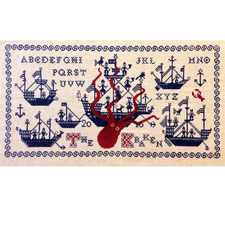 a cross stitch pattern with ships and anchors on the bottom, in blue and red