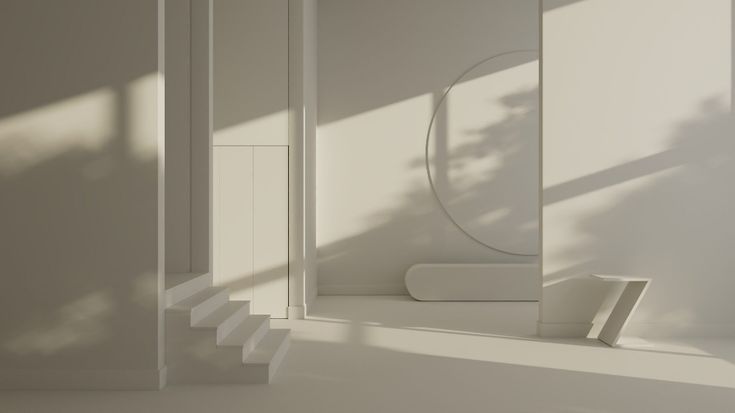 an empty room with white walls and stairs