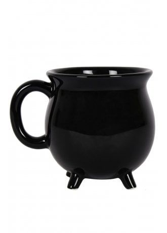 a black coffee mug sitting on top of a white table