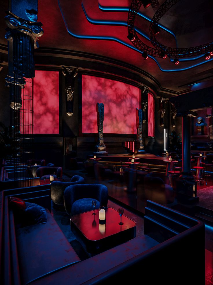 a dimly lit room with red and blue lighting on the walls, couches and tables