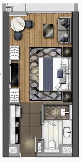 an overhead view of a bedroom and living room in a small apartment with wood flooring