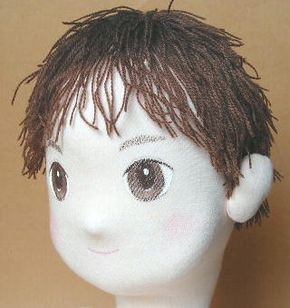 a white mannequin head with brown eyes and hair on it's head